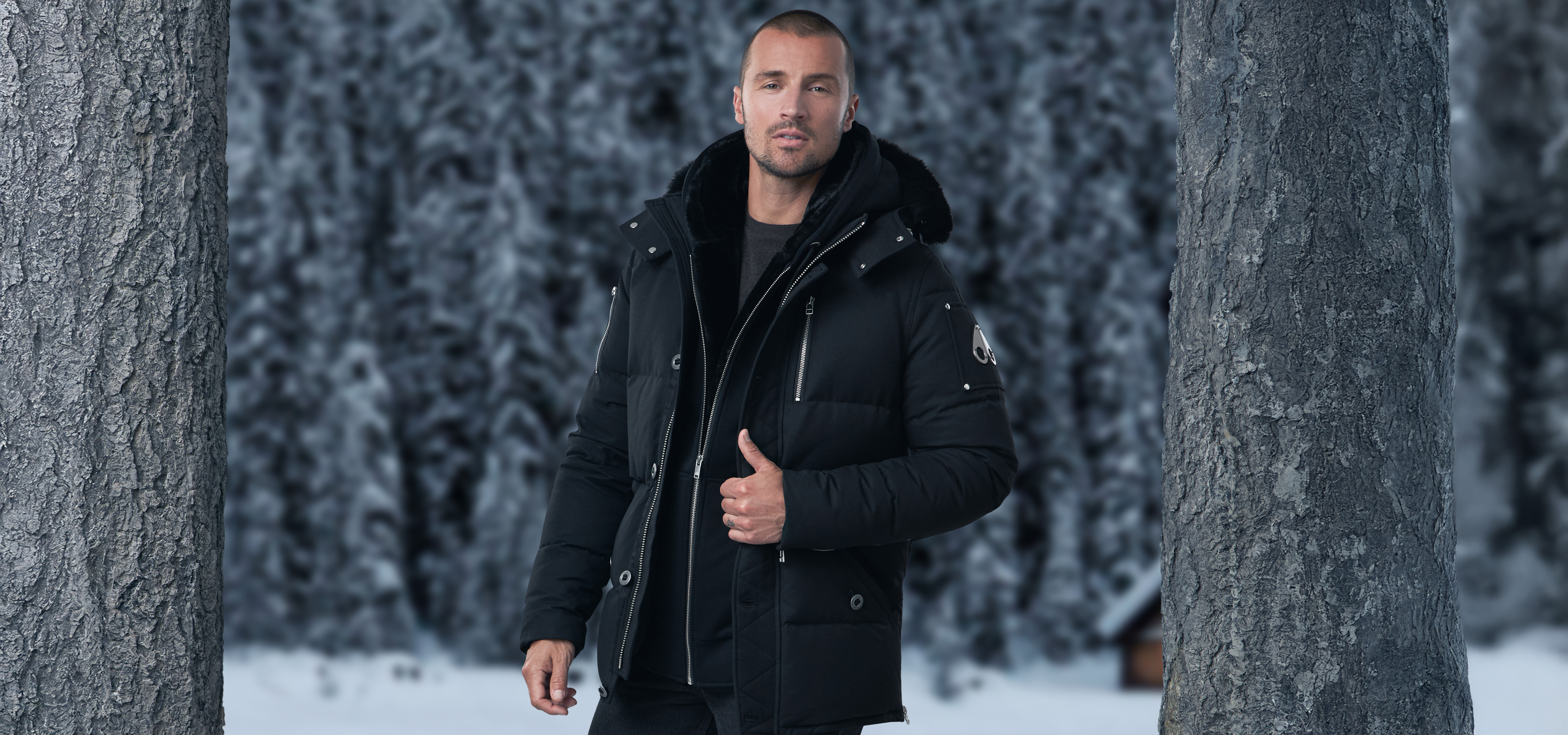 Male model wearing Moose Knuckles winter jacket